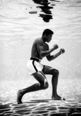 Flip Schulke. Muhammad Ali &quot;training&quot; underwater.  1960 / printed 1990s.