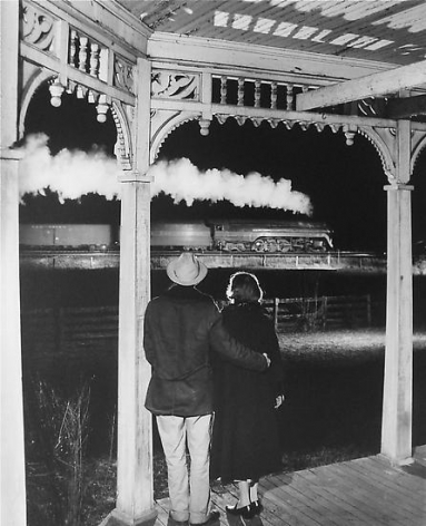  Mr. and Mrs. Ben Pope watch the last steam powered passenger train.&nbsp; Max Meadows, Virginia 1958